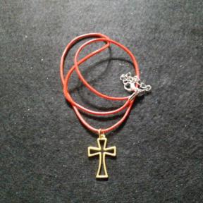 Gold Color Cross on Red Cord Necklace